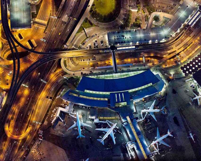 An aerial photograph of JFK airport at night.