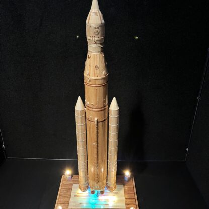 A sculpture of the Artemis SLS Rocket made of matchsticks, wood stirrers and toothpicks.